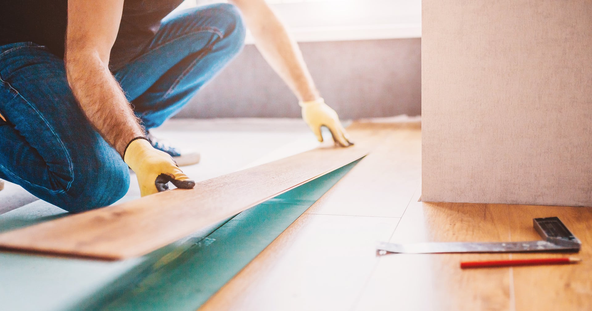 https://www.insideadvisorpro.com/wp-content/uploads/2023/02/Home-Improvement-Pro-Installing-Flooring.jpg