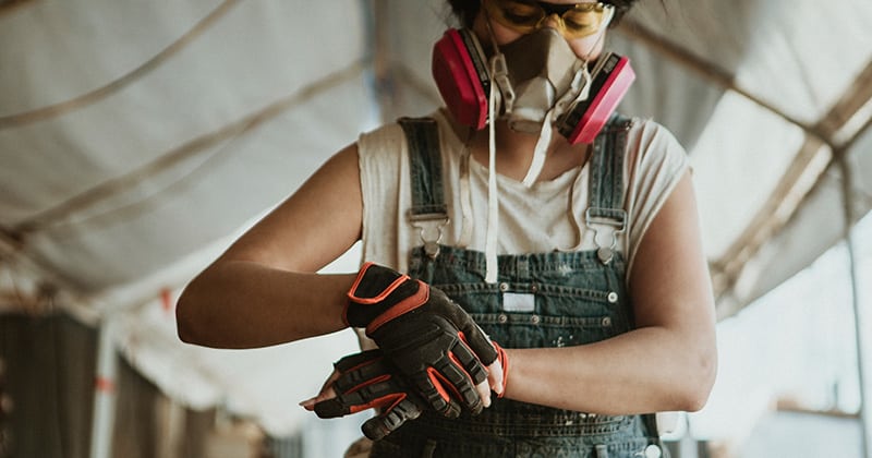 https://www.insideadvisorpro.com/wp-content/uploads/2023/05/Female-Construction-Pro-Putting-on-Gloves.jpg