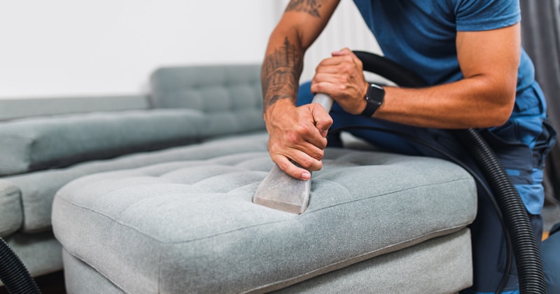 cleaning business vacuuming couch